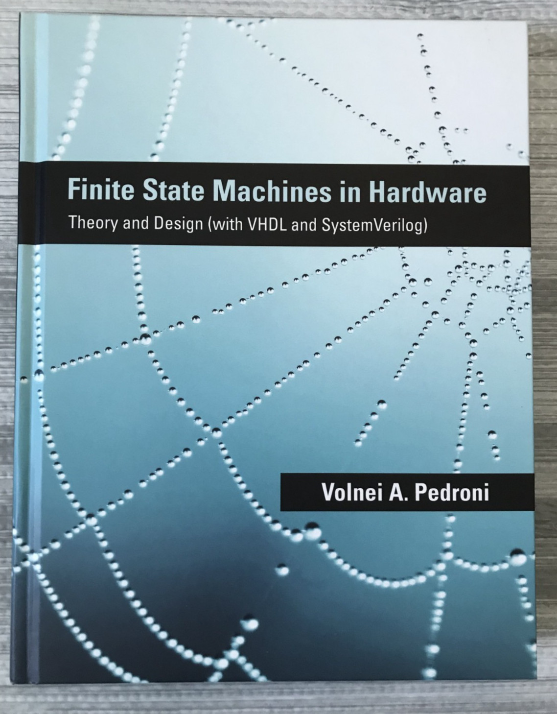 Finite State Machines in Hardware: Theory and Design (w. VHDL and SystemVerilog)